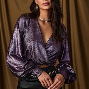 12th tribe metallic purple top. Never worn but does not have tags